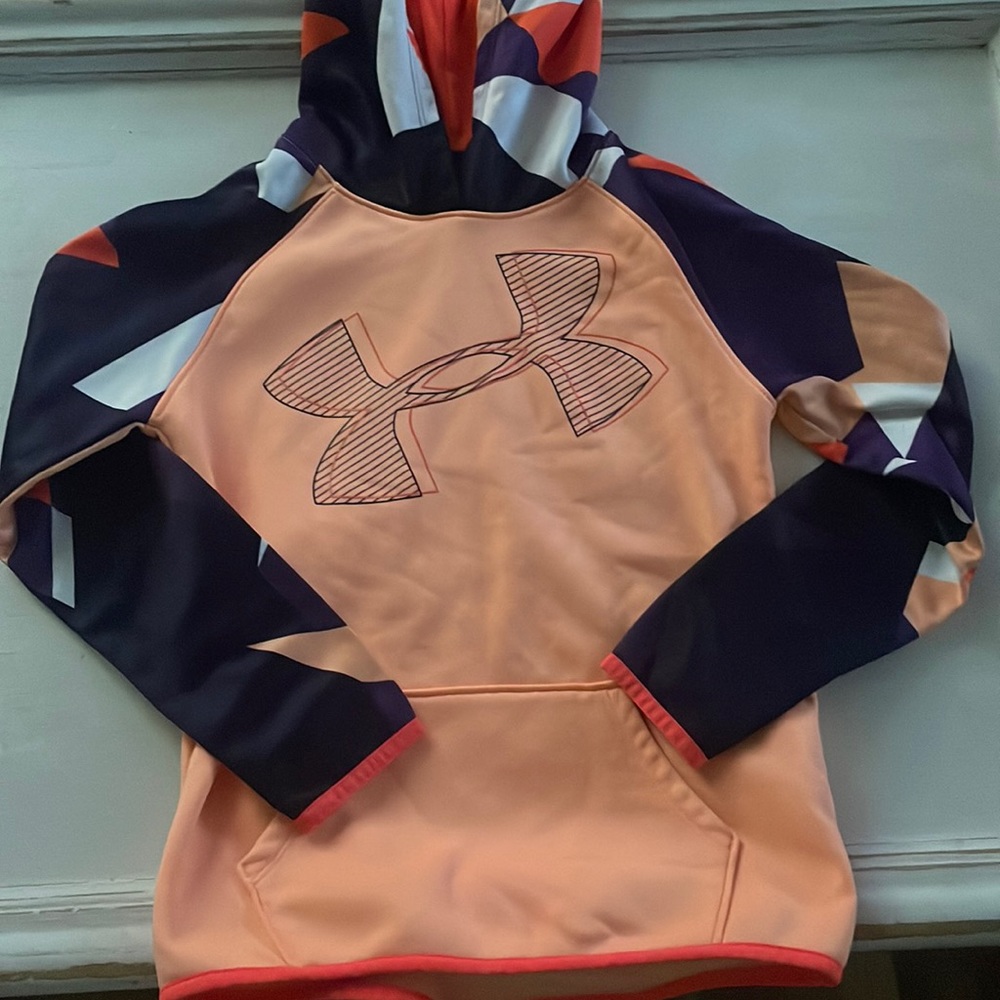 Youth medium under armour hoodie sweatshirt orange with some purple and white.
